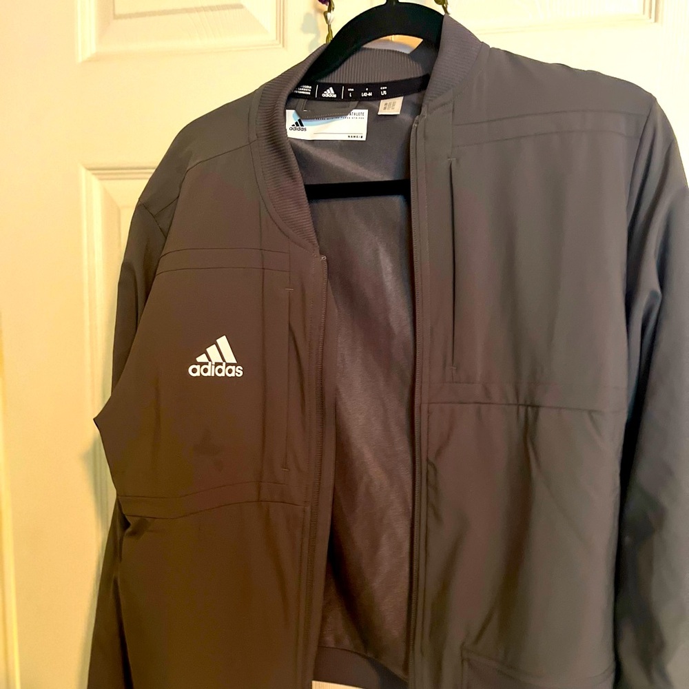 Grey Adidas jacket in size large, barely worn.